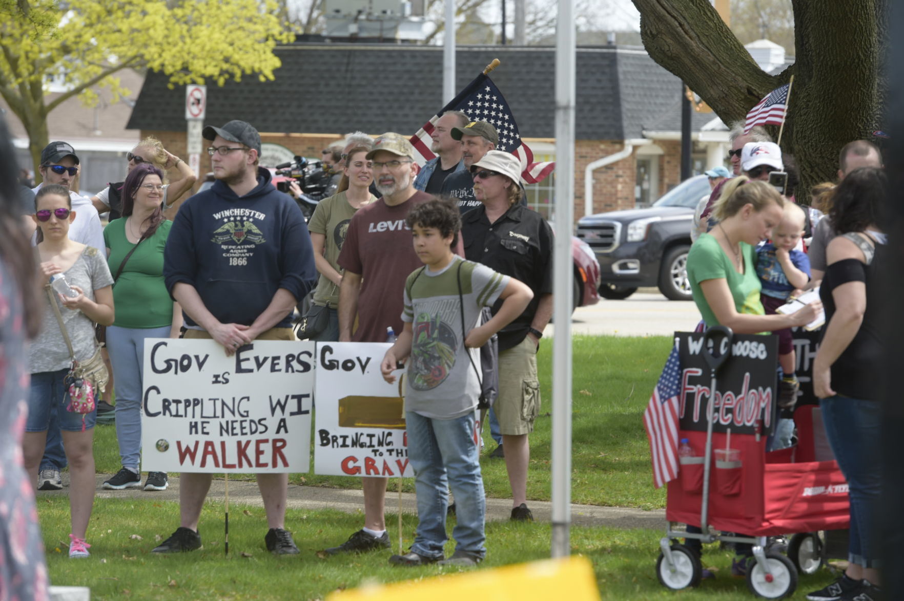Signs call out Evers